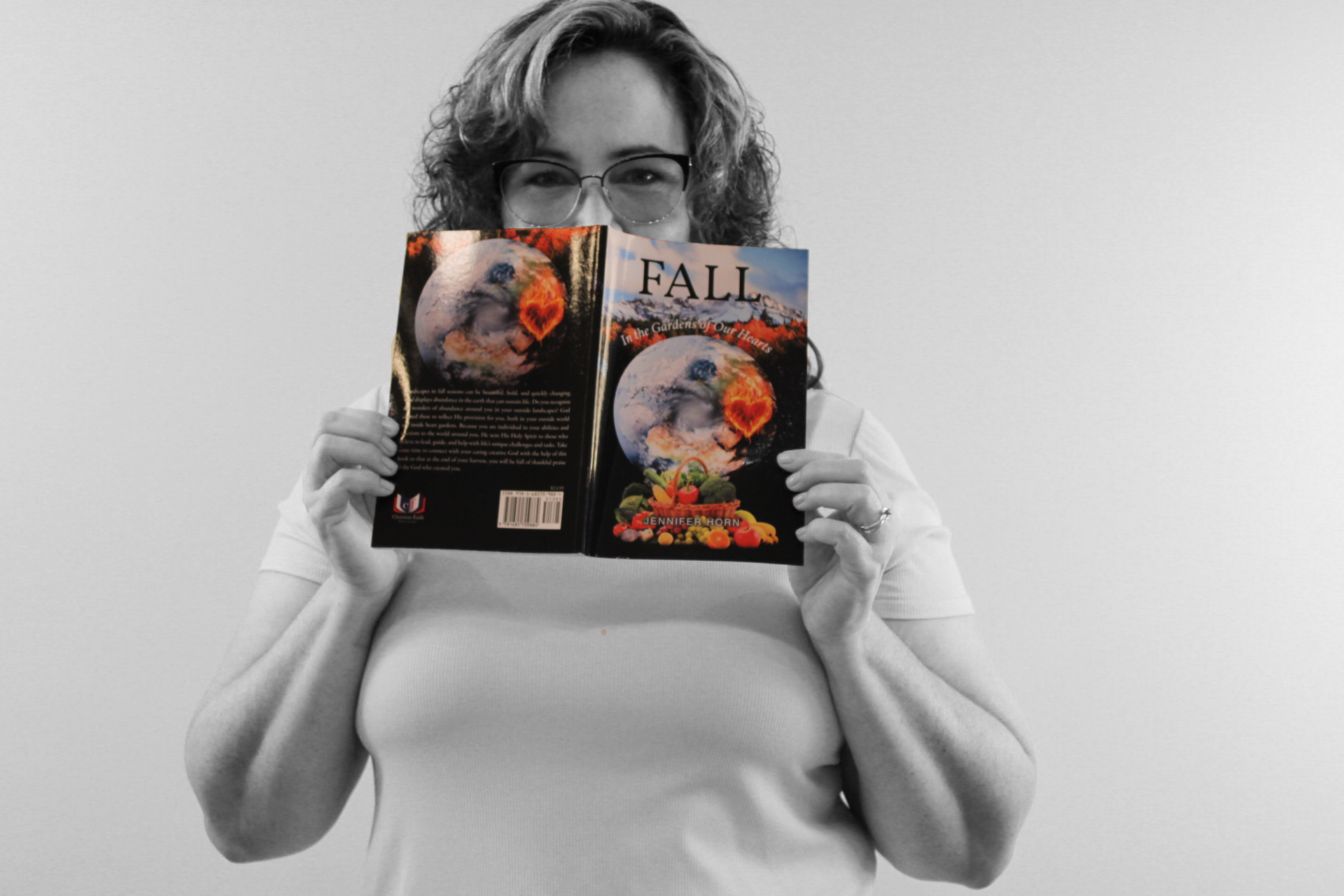 BW_Fall Jen Horn holding up her Fall Devotional book