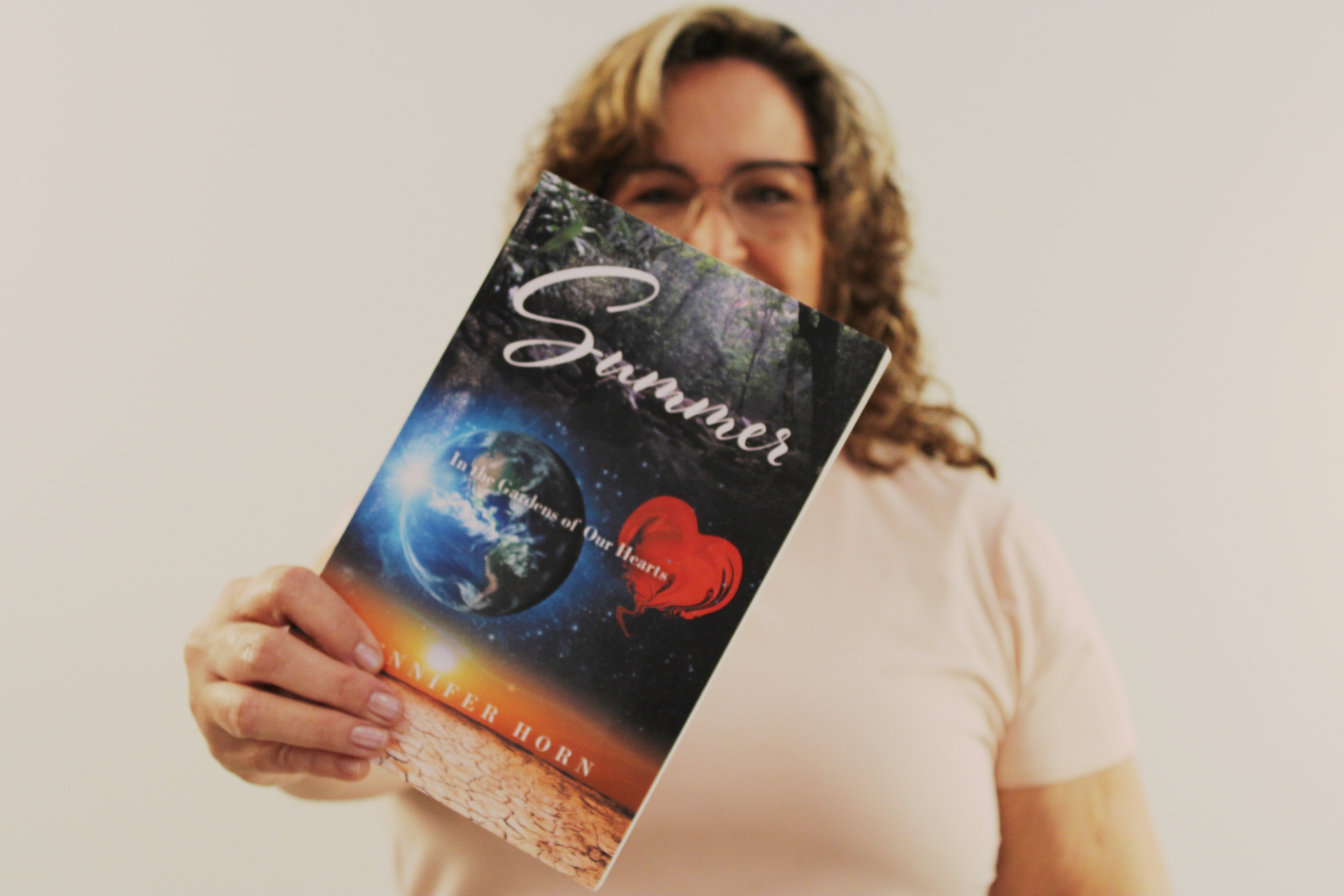Summer_1 Jen Horn holding her Summer Devotional book