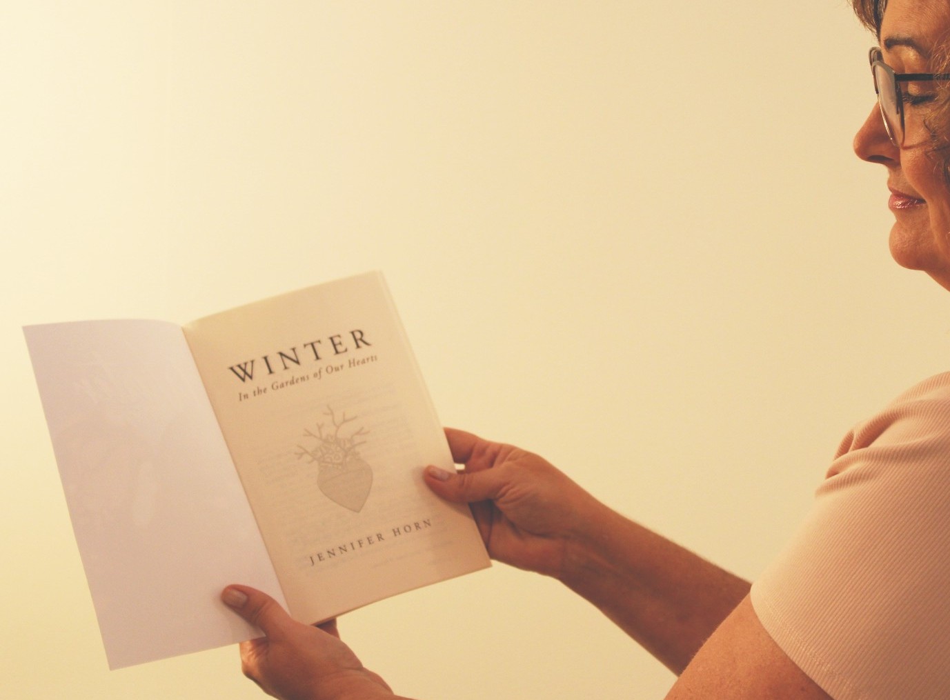 Winter_Cropped Jen Horn holding her Winter Devotional book