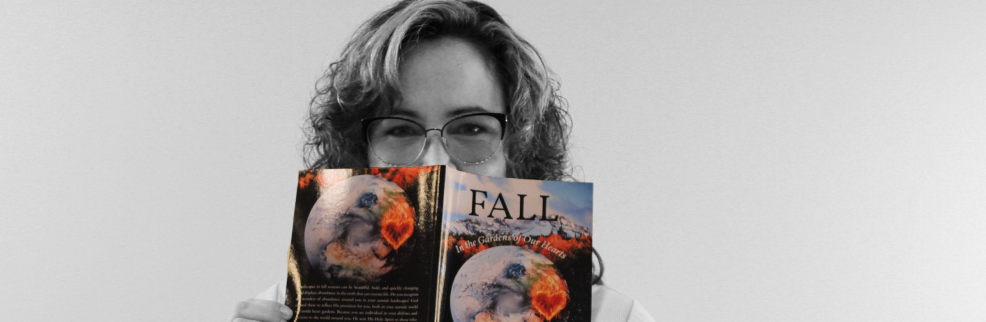 BW_Fall_Cropped Jen Horn holding up her Fall Devotional book